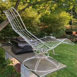 Mid-century, modern home crest rocking lounger