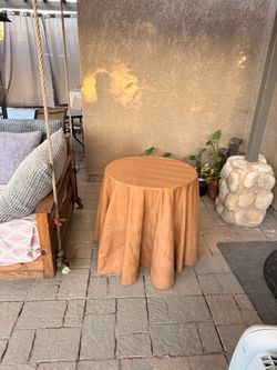Solid Round Table with Tan Fabric Cover