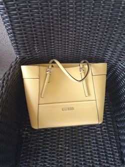 Yellow guess purse