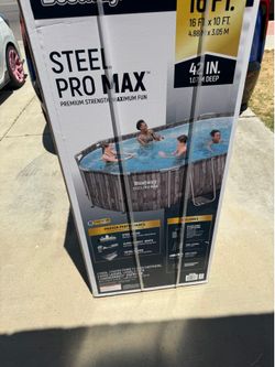 Brand new swimming pool  with filter, pump, ladder, and cover