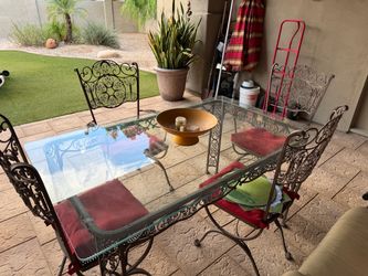 Sturdy iron and glass patio set