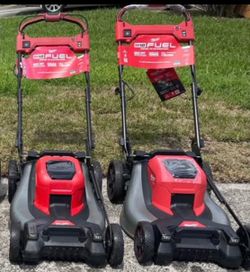 2 Milwaukee Battery Mowers $850 Both