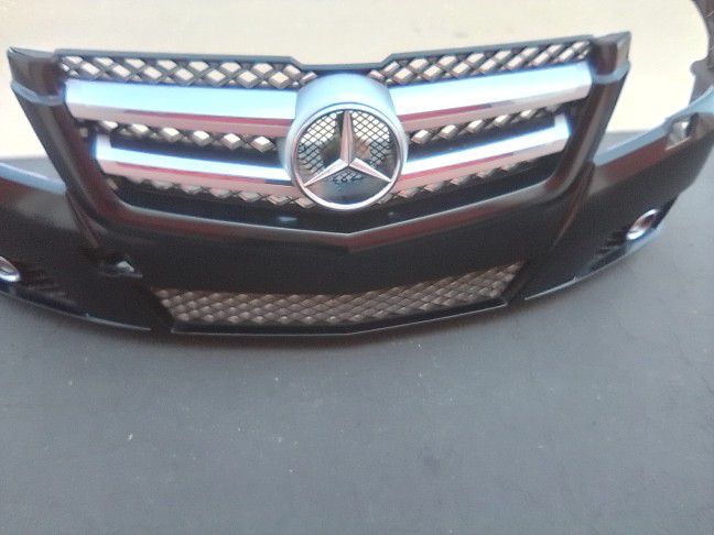 2010-2014 Mercedes GLK350/500 Front Bumper With Fog Lights, Grill And Accessories Oem.