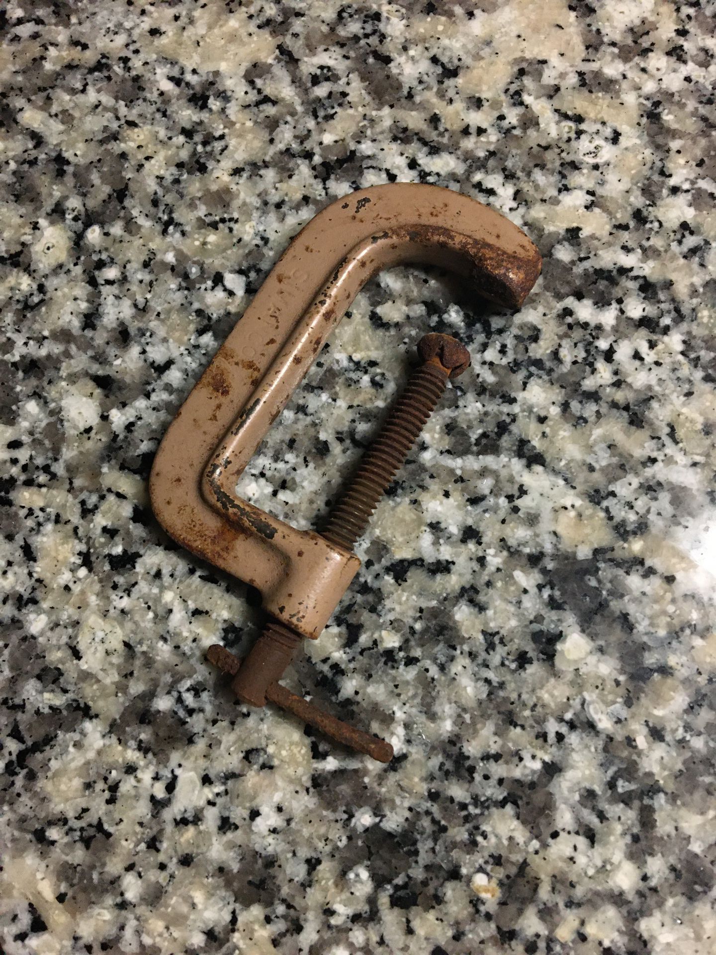 Vintage Simanco (The Singer Manufacturing Company) original part no. 121716 c-clamp for the 20-10 toy sewing machine, tan, 1950s