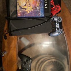 2 Ps4s With Controllers And Cords And Xbox 1s With Controller And Cords