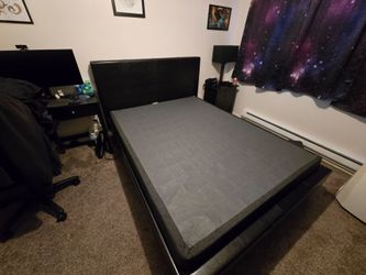 Free Queen size bed frame with wooden slats