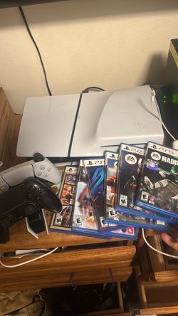Ps5 and 6 games two controllers with charger