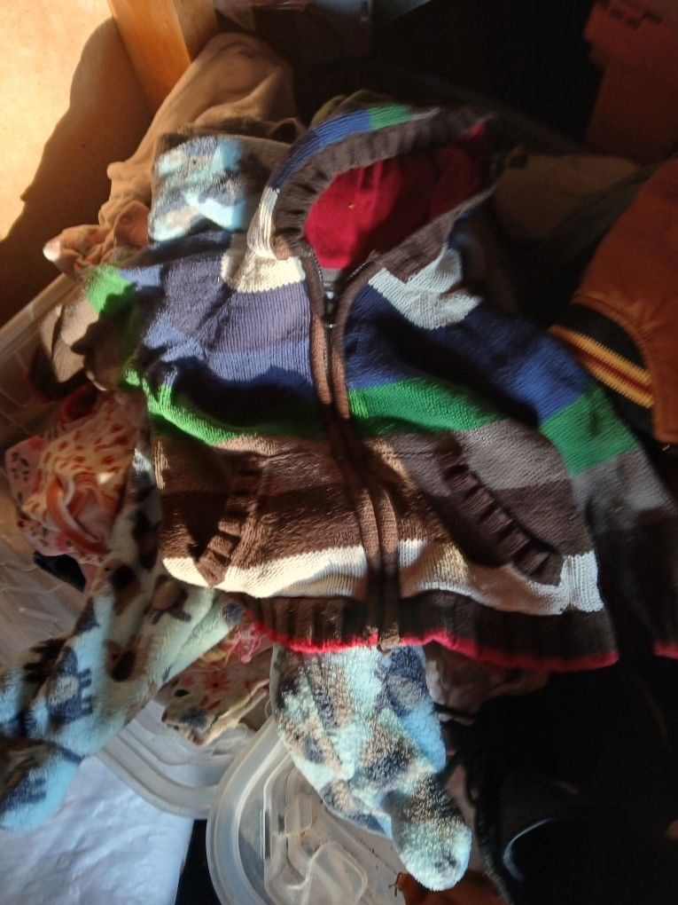 bundles of baby and toddler clothes,shoes,and toys