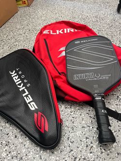 Like new Selkirk paddle, cover and bag