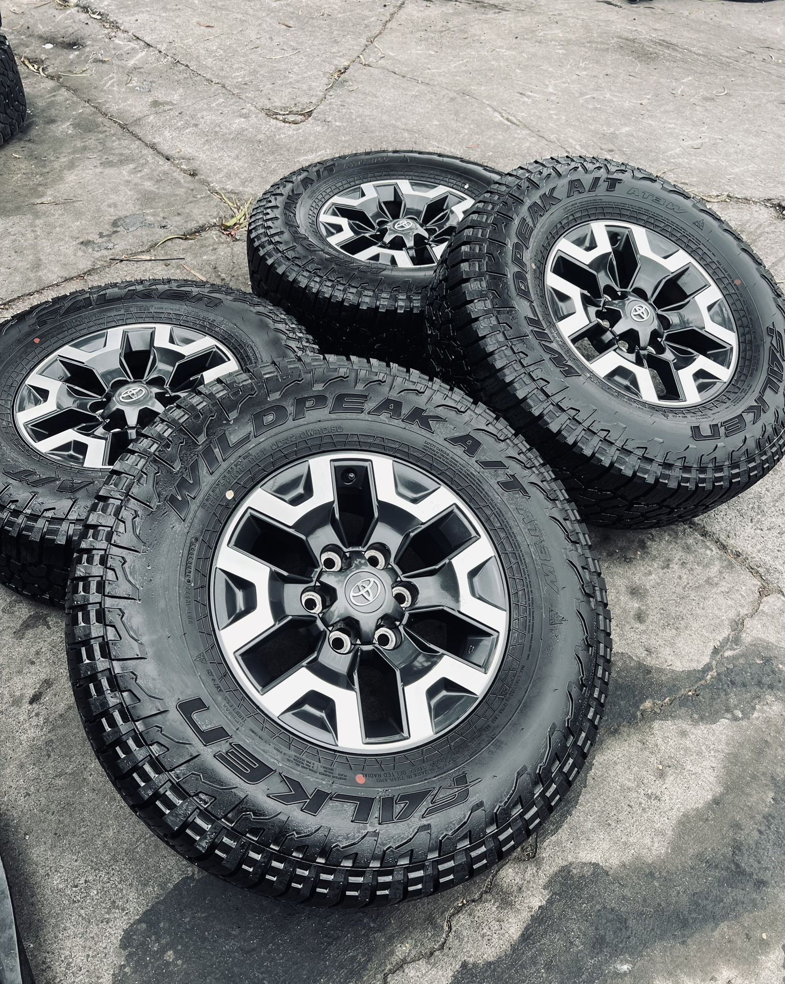 TRD 16” WHEELS & FALKEN 265/75/16 ALL TERRAIN TIRES 1,250 CASH