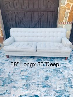 Very comfy sofa in light grey color
