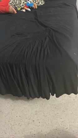 Size large pleaded black shirt