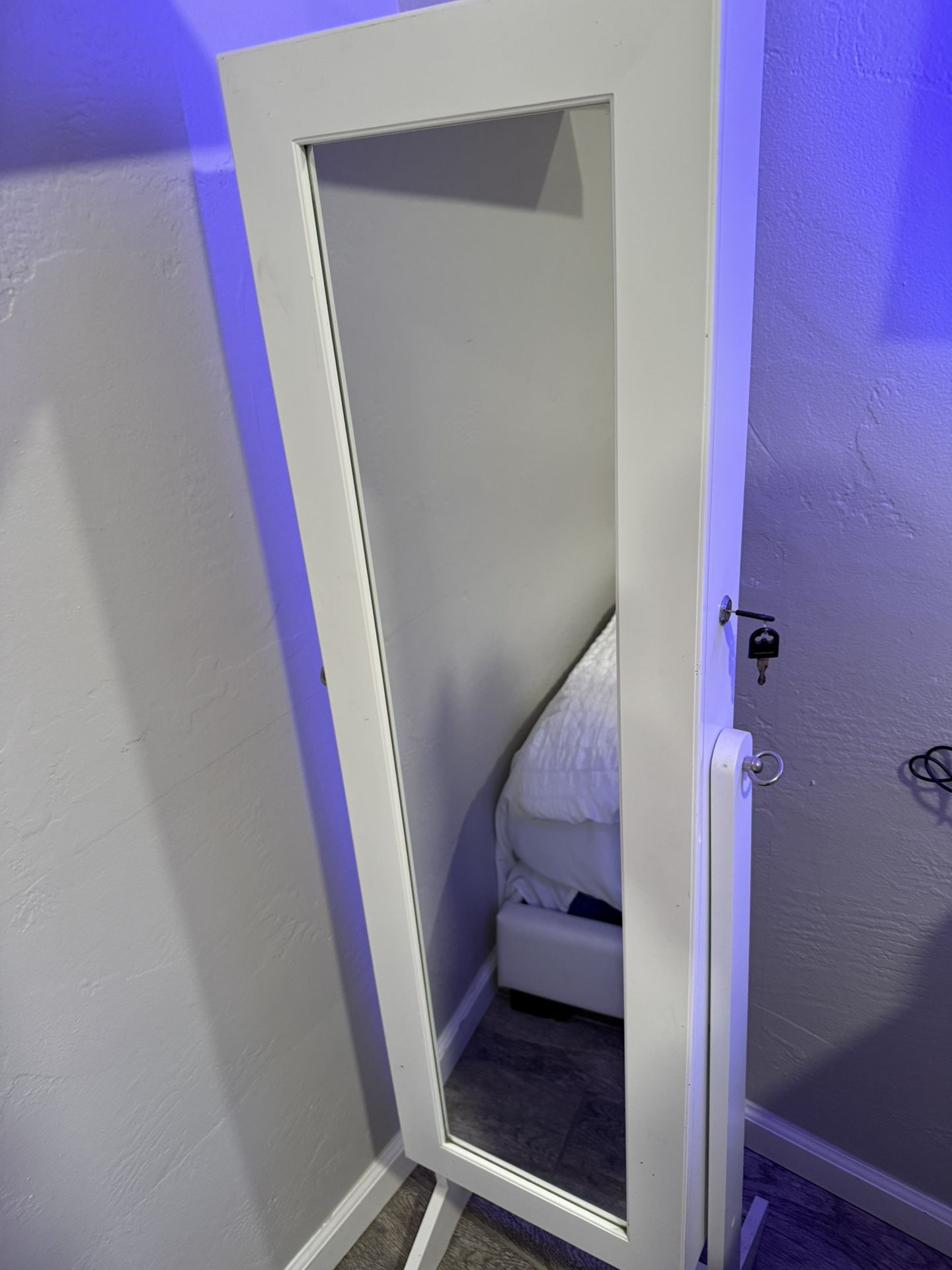 Jewelry closet with lock and mirror