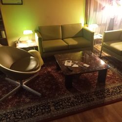 Fairly Used Sofa With Two Side Tables.