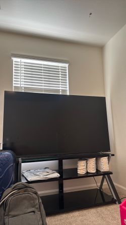 70 Inch VIZION Tv and glass entertainment table