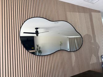 Asymmetrical mirror