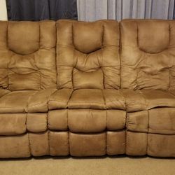 2 Reclining Sofas, chair and a half with ottoman (Ashley Furniture)