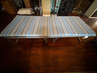Cot with cushion