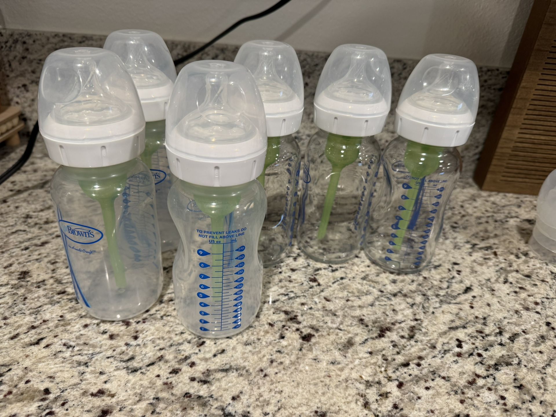 3 Glass And 3 Plastic Bottles