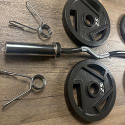 Beautiful BRAND NEW Curl Bar With Pair Of 25s And 10s 