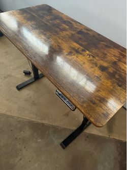 Adjustable height desk