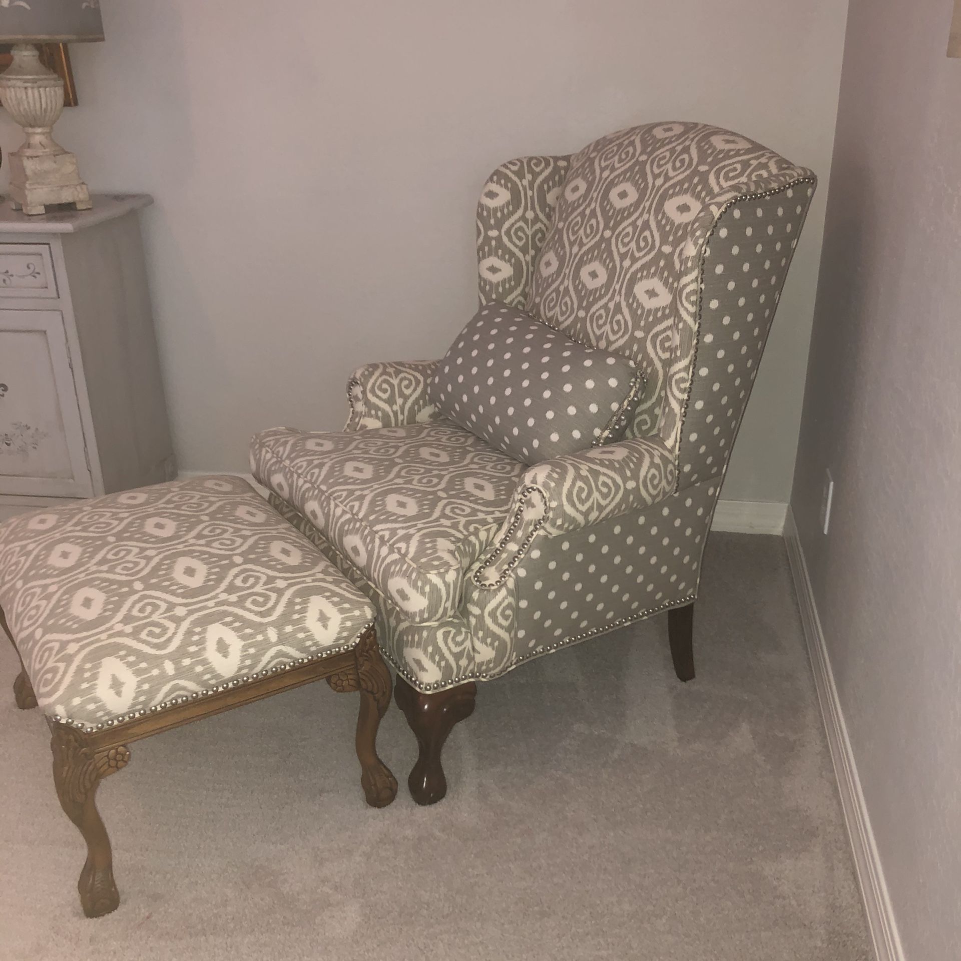 Very nice tan polka dot ikat print chair and ottoman