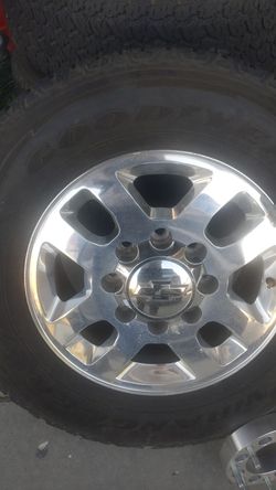Factory chevy Rims --- tires 265/70/18. With spacers to adapt in to rim 16 all for