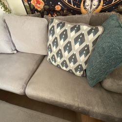 Ashley Furniture L-Shaped Couch, Grey/Blues (115”w, 37”h)