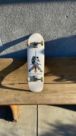03 POWELLS SKATEBOARD.