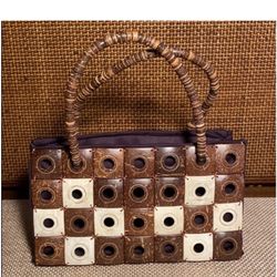  Coconut Shell Top Handle Purse / Handbag Unique Handcrafted from Hawaii Zipper Closure  Wood Beaded Handle Measures: Side to side - 10” Top to Bottom