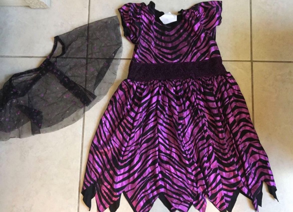 Purple Witch Halloween Costume with hat included ( not shown). Size :2-3 Kid Size
