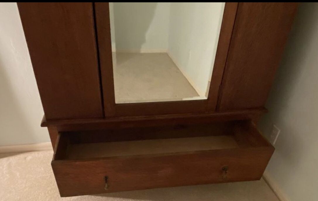 Antique beautiful armoire with mirrored front