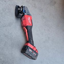 Milwaukee Grainder And Battery.  No Charger 