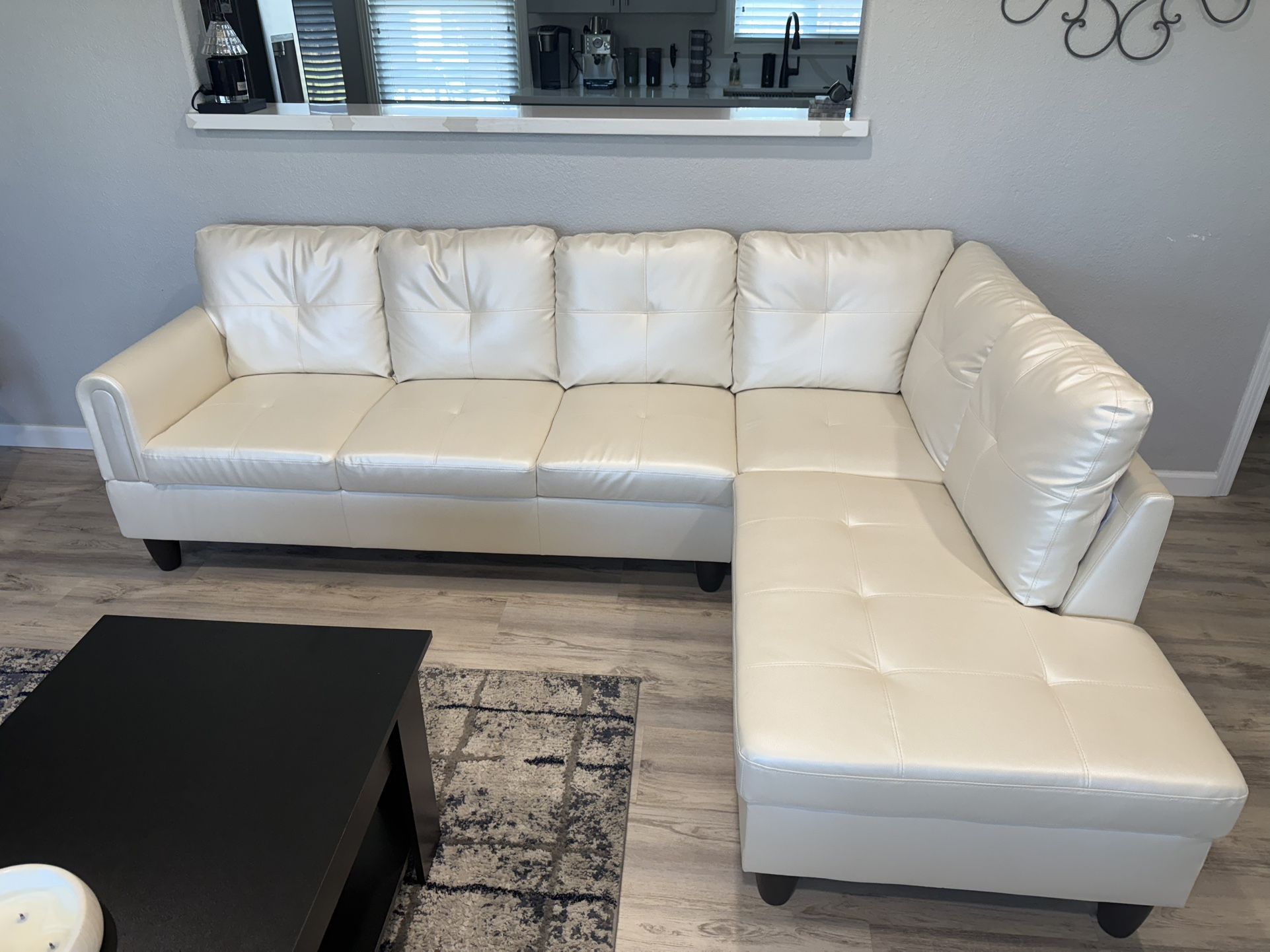 Cream Colored Faux Leather Sectional