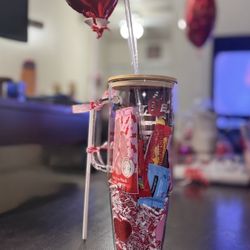Valentine Glass Tumbler Filled With Goodies And Balloon