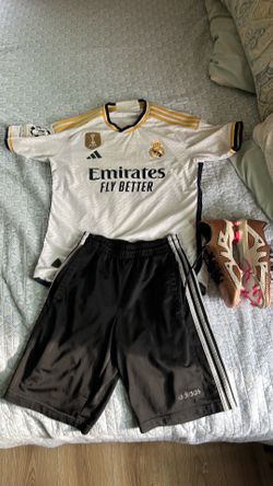 REAL MADRID JERSEY,ADIDAS SHORTS,AND NIKE CLEATS.