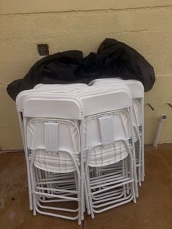 40 white foldable party chairs