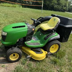 John Deere  L120 Automatic 46” Deck And 20 HP Engine And 2 Bin Bagging System Riding Mower