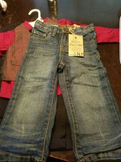 Brand new baby distressed jeans