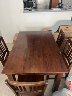 Wood dining room table + 4 chairs