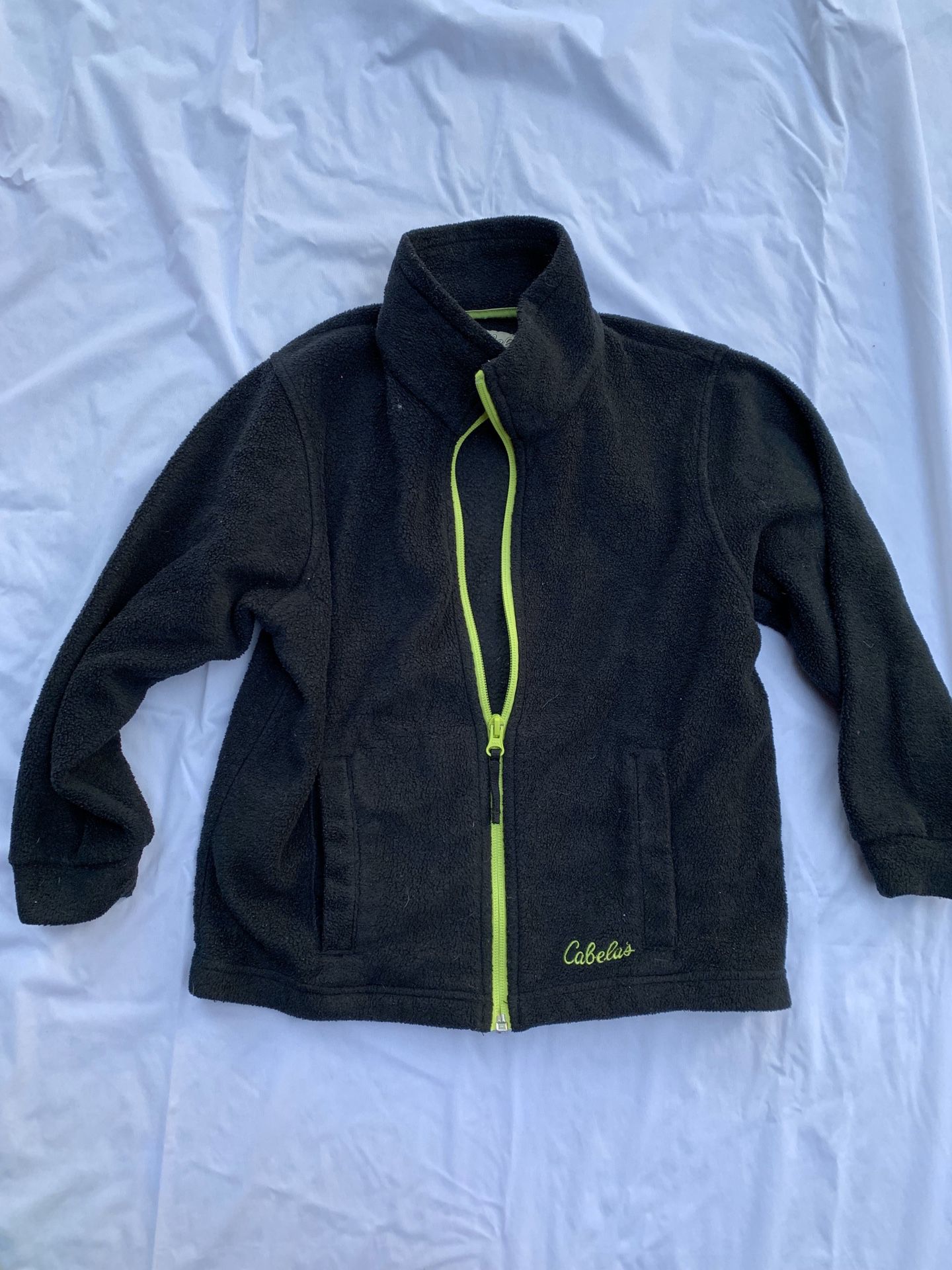 Cabela s black fleece youth size xs 6/7 lime green piping , emblems and zipper