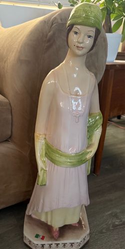 Vintage doll statue