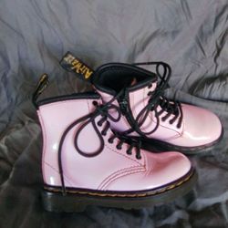 Girls Dr. Martens Cushion Sole Light Pink Boots. 