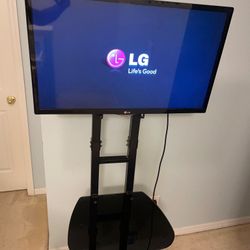 TV Stand with remote and TV