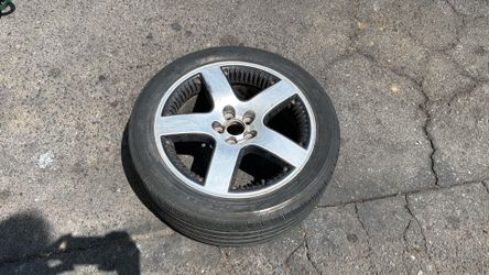 One VW Beetle 17 Inch Five spoke aluminum wheel and old tire 5x100mm