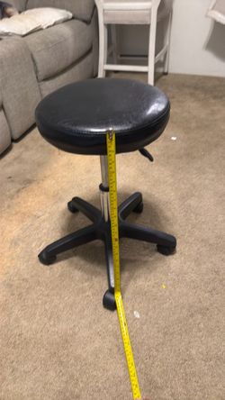 Black cushion roller chair