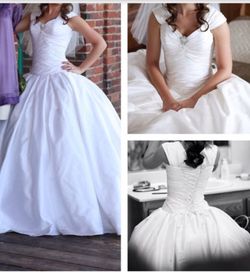 Wedding dress by Maggie Sottero