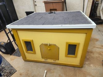 Large wood dog house. Used - good.