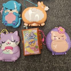 several Polly Pocket animal-themed compacts, including the Hedgehog Coffee Shop. 