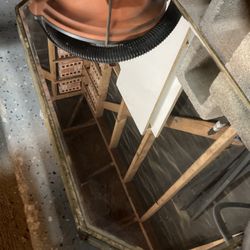 It’s small perfume holder mirror said